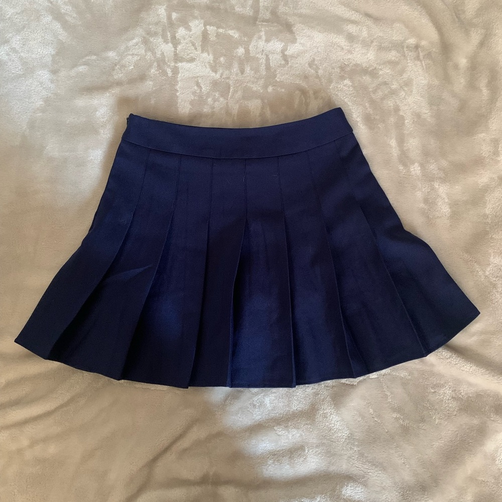Navy blue “school girl” skirt.